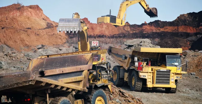 Heavy machinery working in a coal mine