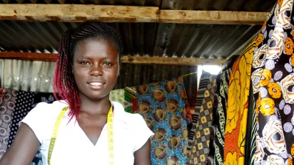 young lady in her clothing shop