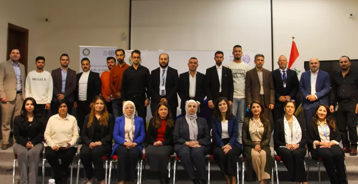 a group of people meeting During the 19th meeting of the National Committee for Pay Equity at the Jordanian National Commission for Women.
