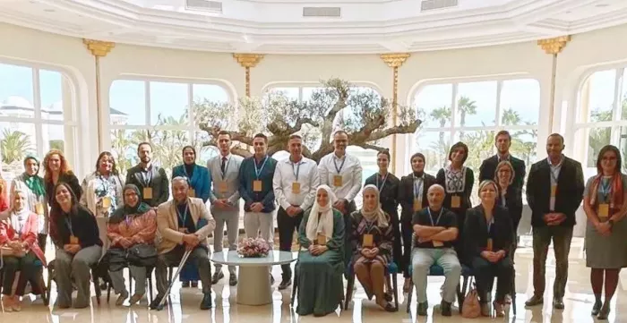 Group photo of participants at an ILO-organized Regional Seminar to address challenges related to Youth Not in Employment, Education, or Training (NEET) across the Southern Mediterranean, held in Tunis from 21 to 23 October 2024.