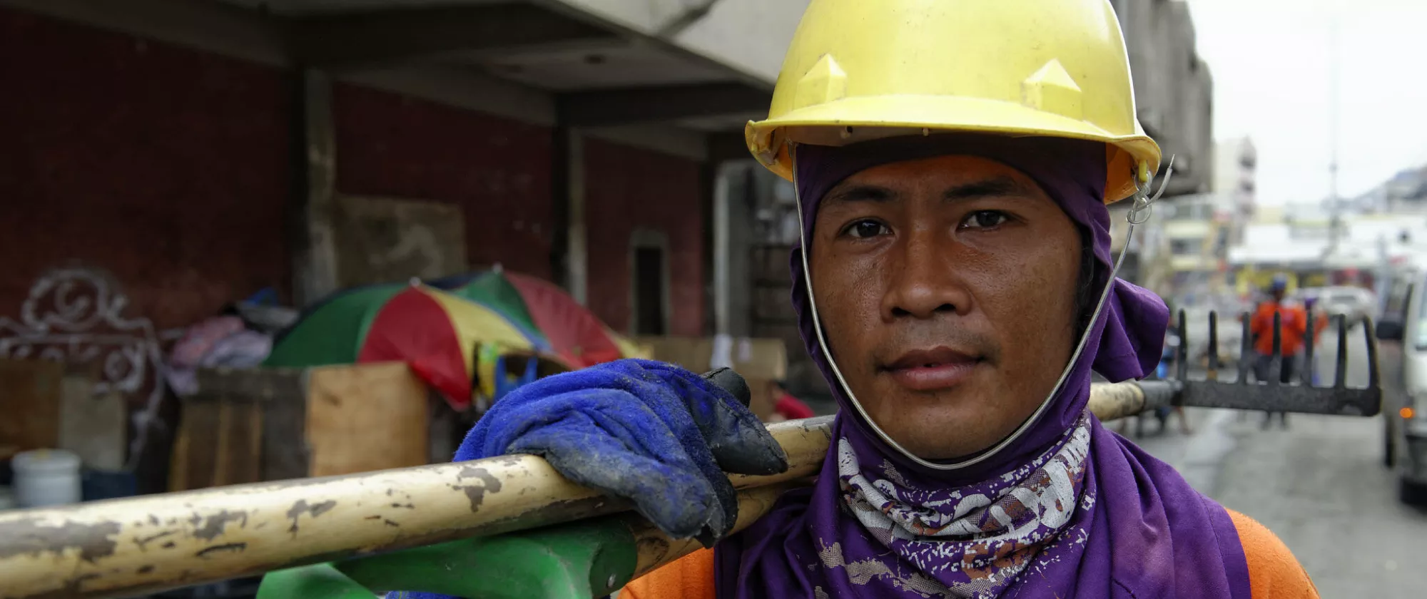 Worker removing debris in the Philippines